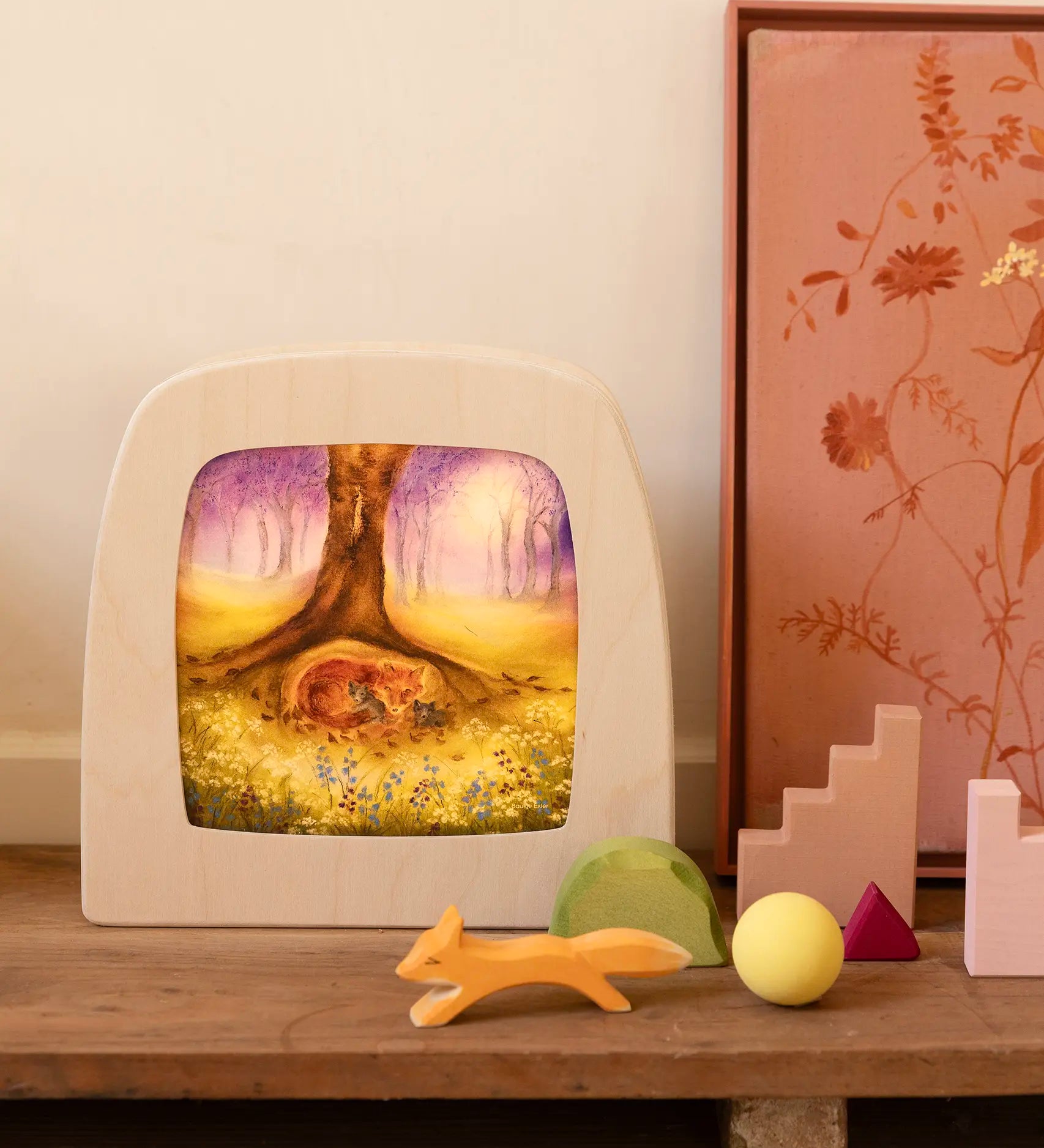 Toverlux Magic Wooden Lamp with artwork of a fox in a forest by by Bauke Exler in a room detting next to an Ostheimer running fox.