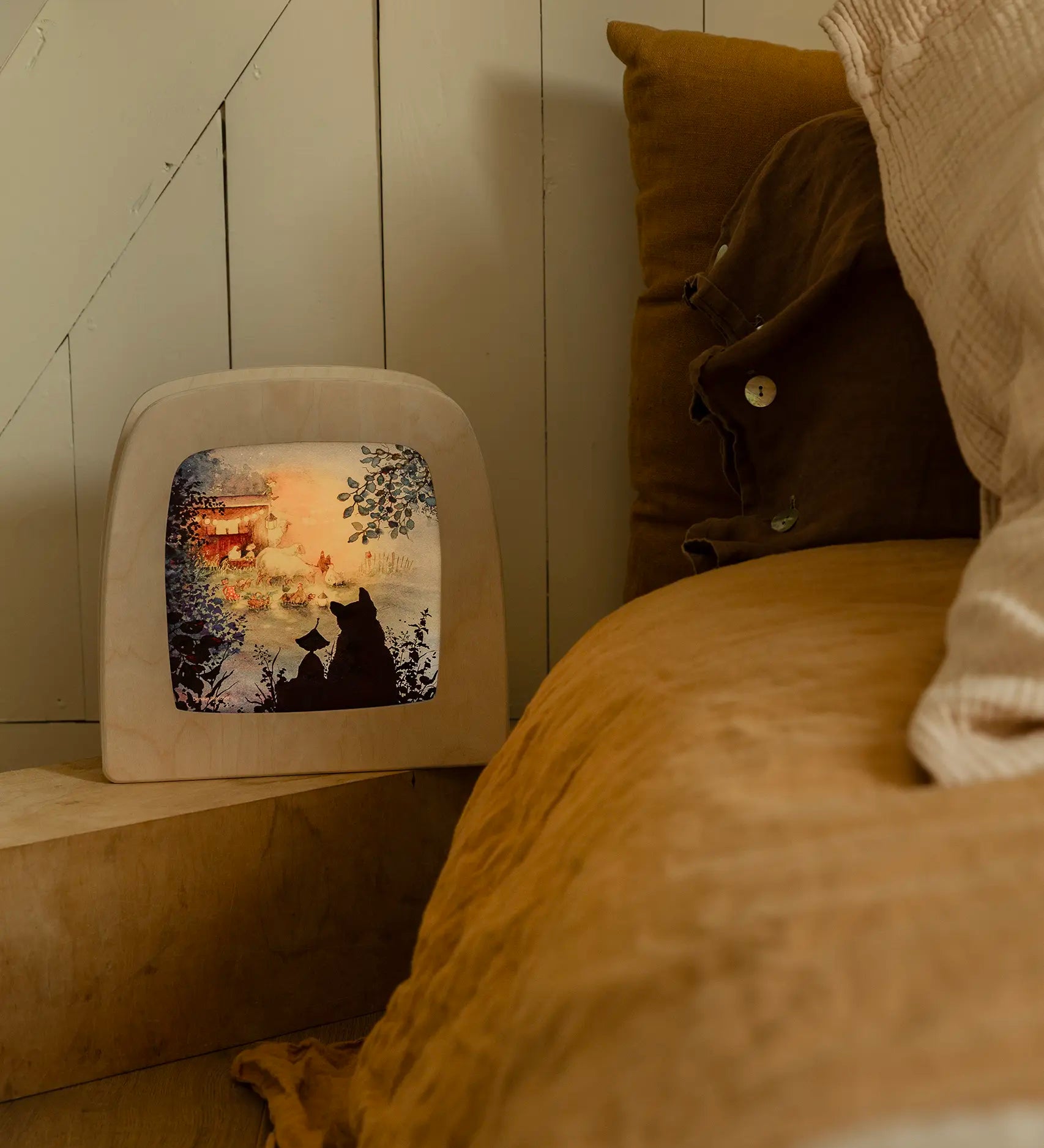 Toverlux Wooden Magic Lamp featuring Griswald artwork by Daniela Drescher, in a bedroom setting.