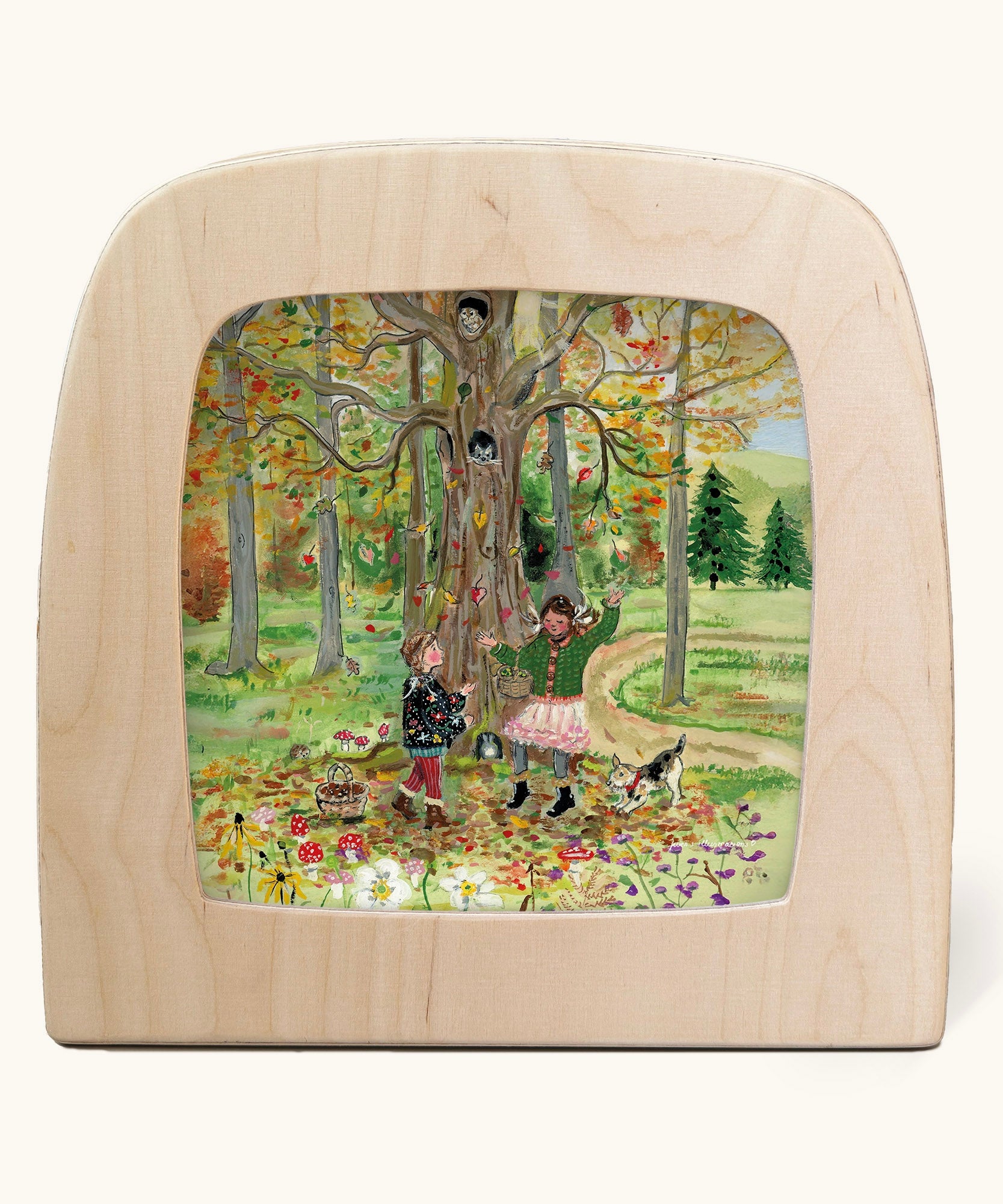Toverlux Autumn Leaves Delight Toadstools Magic Lamp silhouette by artist Gwen van Knippenberg. A watercolour and pencil style illustration of children dancing under a tree whilst leaves are falling down around them.