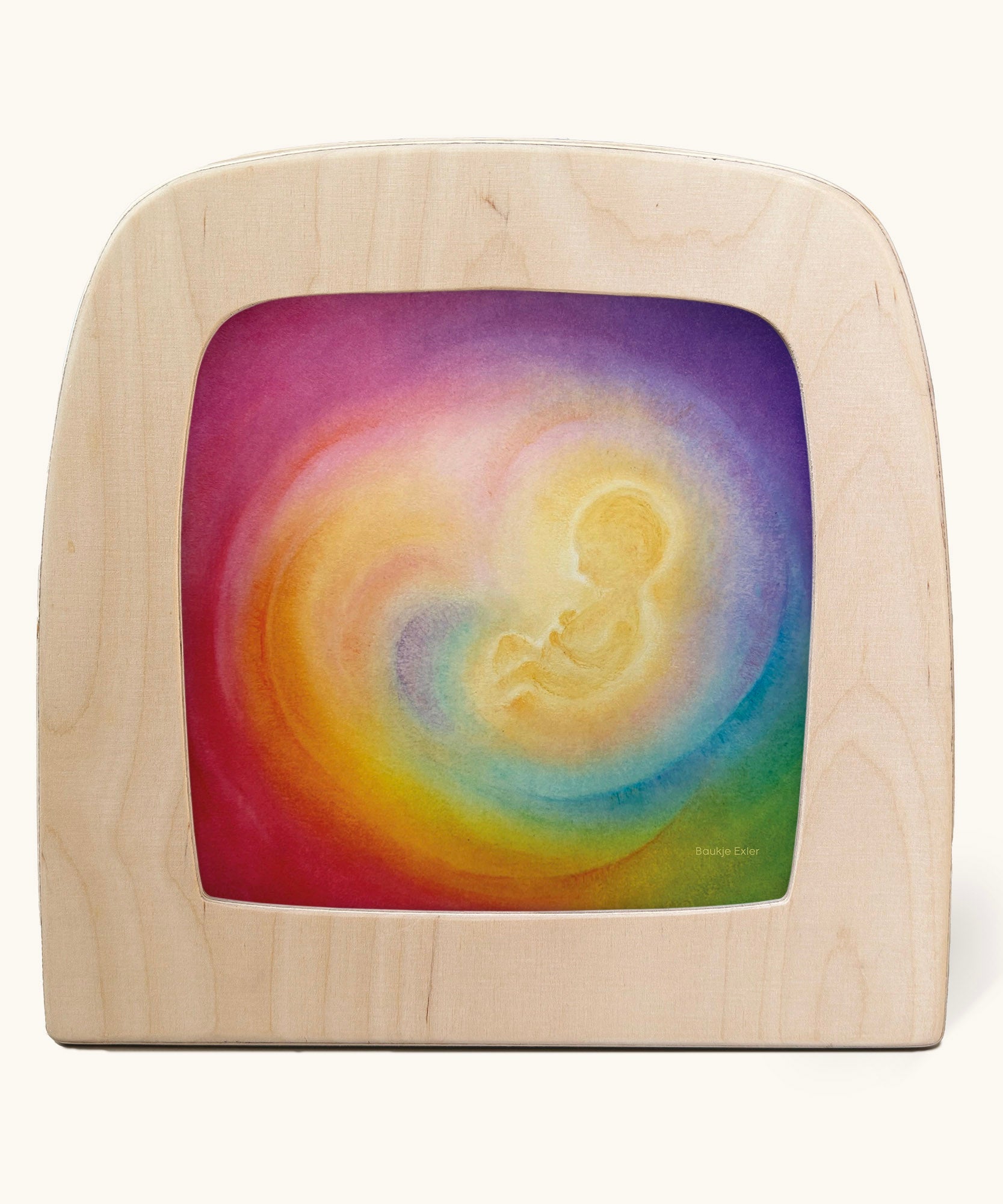 A Toverlux silhouette in the magic lamp with baby in womb rainbow artwork by Baukje Exler. A pastel illustration of a baby in a womb with a dreamy rainbow background.