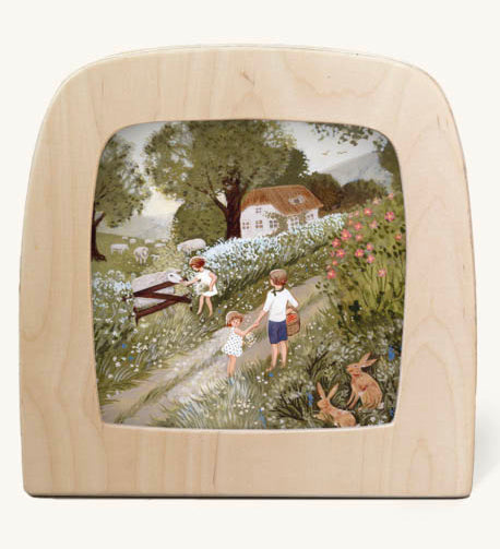 Cow parsley Toverlux Magic Lamp silhouette inside a wooden magic lamp. Artwork By Robin-Pieterse. A delicate painting style illustration of children walking on a country road picking fruit with one feeding a sheep. This silhouette is available at Babipur