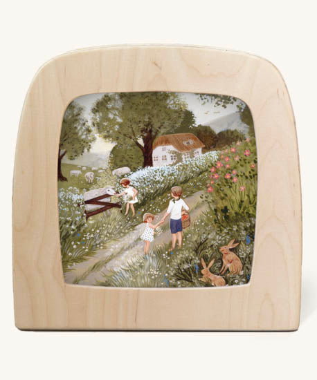 Cow parsley Toverlux Magic Lamp silhouette inside a wooden magic lamp. Artwork By Robin-Pieterse. A delicate painting style illustration of children walking on a country road picking fruit with one feeding a sheep. This silhouette is available at Babipur