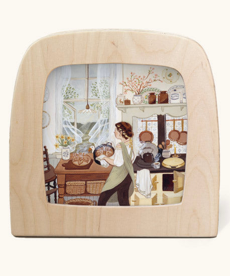 SourdoughToverlux Magic Lamp silhouette inside a wooden magic lamp. Artwork By Robin-Pieterse. A delicate painting style illustration of a woman baking bread in the kitchen with the window open. This silhouette is available at Babipur