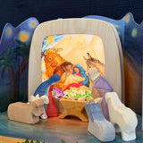 Toverlux nativity scene layered advent story silhouettes in a wooden light frame and surrounded by various Ostheimer wooden nativity figures