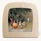Toverlux sun egg gathering silhouette by Elsa Beskow available at Babipur. The image shows the a illustration of woodland fairytale animals and characters looking at an orange.