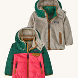 Patagonia Baby Reversible Tribbles Hoody -  Sierra Pink. With a green, pink and dark gold outer, and a green and dark gold inner on the fleece lining