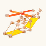 A helictopter made from various wooden poles and blocks out of the Trigonos mini large construction set 