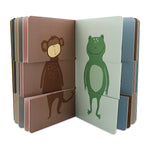 Trixie Flip-Flap Animals Book pages open showing a monkey and frog character.