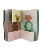 Trixie Flip-Flap Animals Book with the pages open showing different animal combinations.