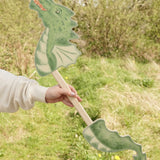 VAH wooden dragon hobby horse toy in green, fire-breathing, with a pointed tail.