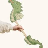 VAH wooden dragon hobby horse toy for child in green, fire-breathing with pointed tail.