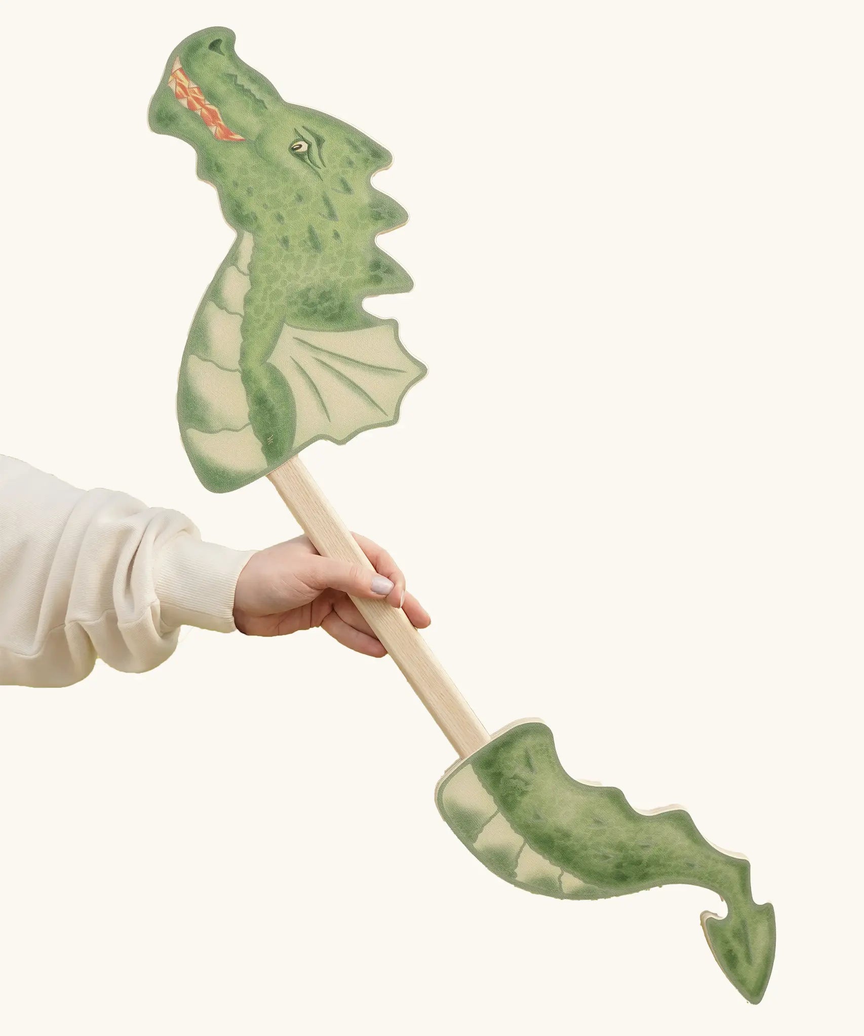 VAH wooden dragon hobby horse toy for child in green, fire-breathing with pointed tail.