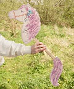 VAH wooden hobby horse toy with purple mane and tail and flowers on brown tack.