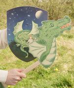 VAH wooden dragon hobby horse toy in green, fire-breathing, with Mika toy shield in blue.