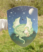VAH wooden toy shield, Mika with green dragon on blue background with moon and stars, for pretend play battles.