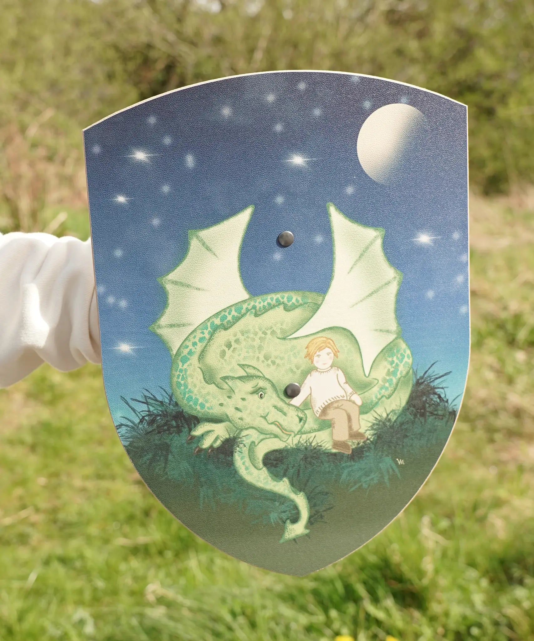 VAH wooden toy shield, Mika with green dragon on blue background with moon and stars, for pretend play battles.