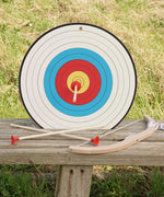 VAH wooden toy sports target, in white with blue red and yellow bullseye, next to safety arrows and mini bow.