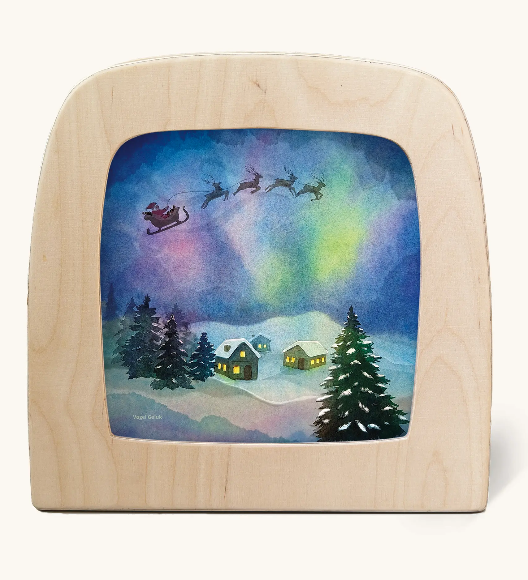 Toverlux silhouette of Father Christmas flying through the sky with Northern lights, snowy houses and Christmas trees, for December and Christmas Eve celebrations.