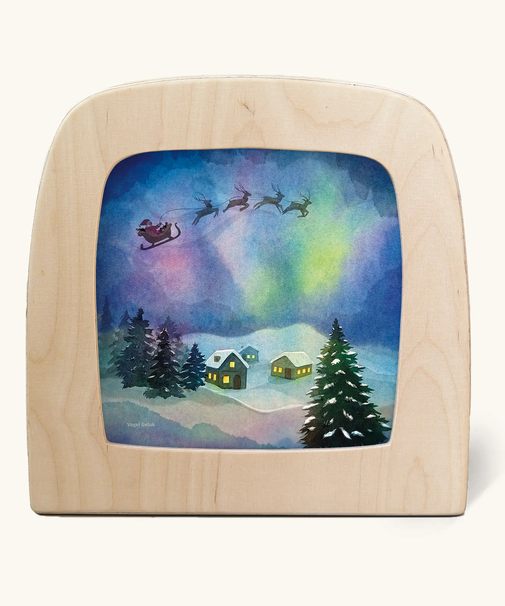 Toverlux silhouette of Father Christmas flying through the sky with Northern lights, snowy houses and Christmas trees, for December and Christmas Eve celebrations.
