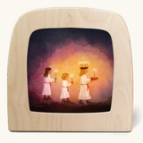Toverlux silhouette of kids carrying candles for St Lucia Day, for December and Christmas celebrations.