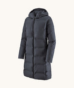 Dark gray puffer coat on a white background