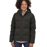 A woman wearing the Patagonia Women's Jackson Glacier Jacket in Black.