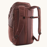 A view of the back of a The Patagonia Black Hole Pack 32 litre capacity backpack in dulse mauve colour.