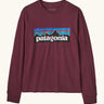 Patagonia Kids Organic Long Sleeve Top in Berry Fig. A Maroon body with classic Patagonia p-6 logo on the chest.