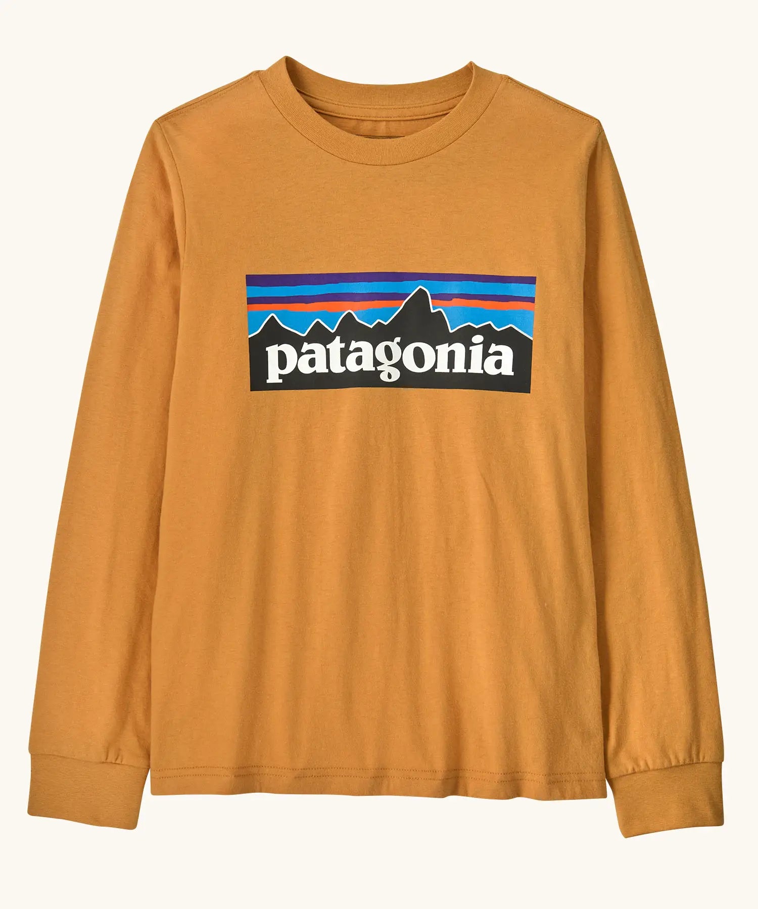 Patagonia Kids Organic Long Sleeve Top in Dried Mango. An orange body with classic Patagonia p-6 logo on the chest.