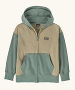 Patagonia Kids Full-Zip Hoody Sweatshirt in weathered stone. Beige body with the classic patagonia p-6 logo patch sewn on one side. Sage green Hood, pockets, waistline and arms. 