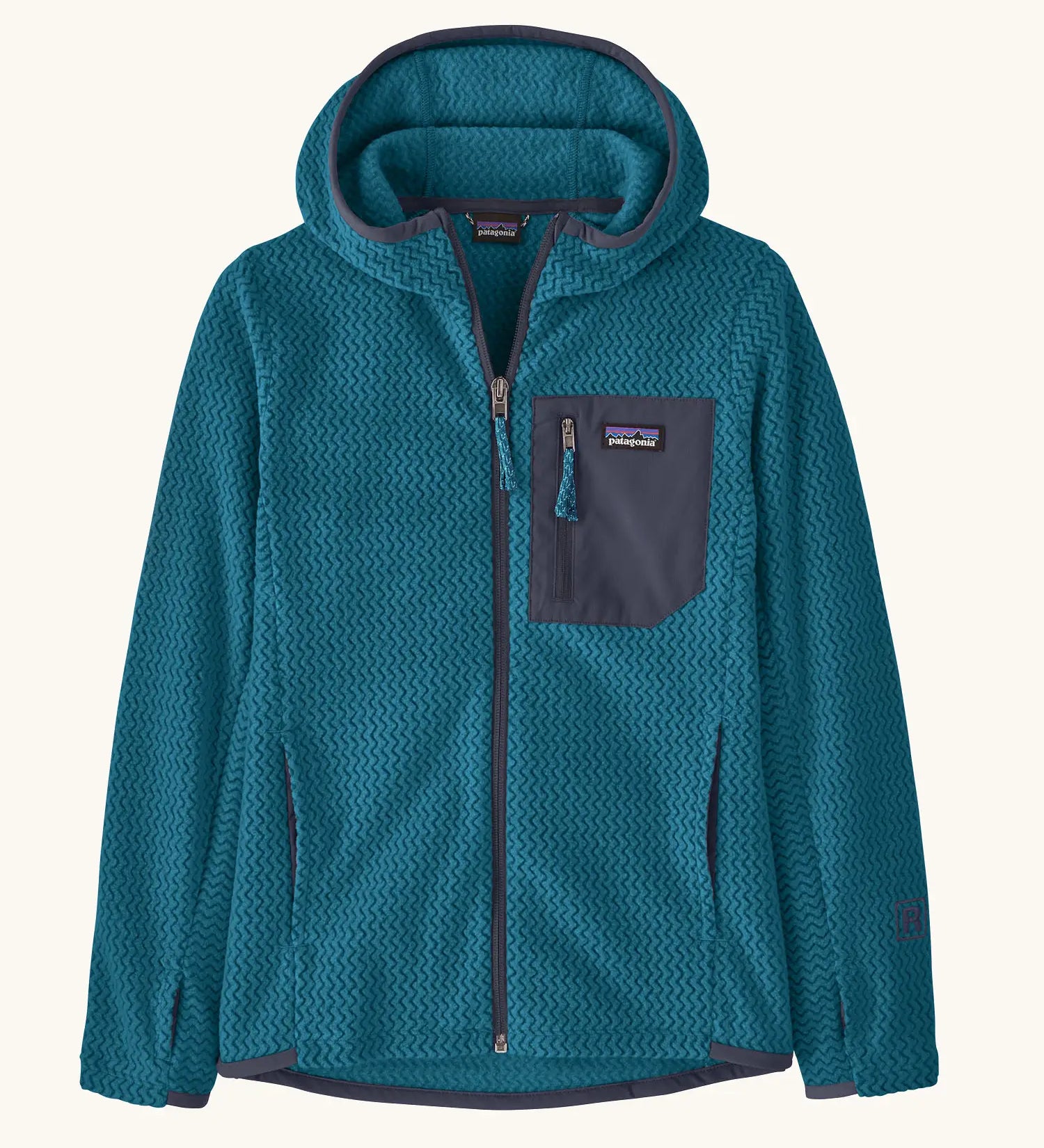 Patagonia Kids’ R1 Air Full-Zip Hoody in Glacial Blue. Deep turquoise ribbed body with dark grey binding and square chest pocket, with thumb holes.