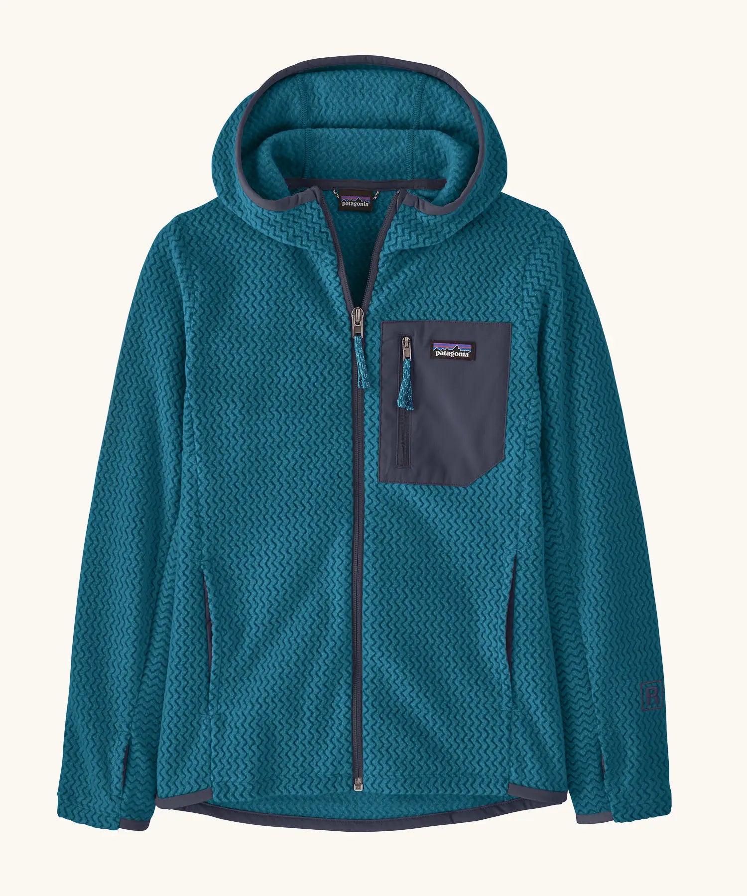Patagonia Kids’ R1 Air Full-Zip Hoody in Glacial Blue. Deep turquoise ribbed body with dark grey binding and square chest pocket, with thumb holes.