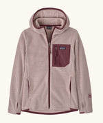 Patagonia Kids’ R1 Air Full-Zip Hoody in Pink Frost. Pale pink ribbed body with contrasting maroon binding and square chest pocket, with thumb holes.