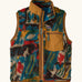 Patagonia Kids Retro X Fleece Vest in Lets Chat, Den Brown. Soft fleece in a Multicoloured abstract pattern, brown binding, and a matching chest pocket.