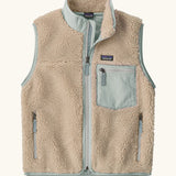 Patagonia Kids Retro X Fleece Jacket Vest in Natural with Virtually blue. soft cream fleece, contrasting pale blue binding, and a matching blue chest pocket.