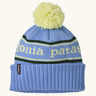 Patagonia Kids Powder Town Beanie in Park Stripe: Diver Blue. A pale blue knit with lime green 'Patagonia' woven around the head, a rib-knit cuff, and a lime green pom-pom on top. 