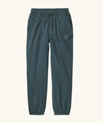 Patagonia Kids cotton Sweatpants in Fitz Roy Massif: summit blue. dark slate blue body with a small mountain line graphic on the hip.