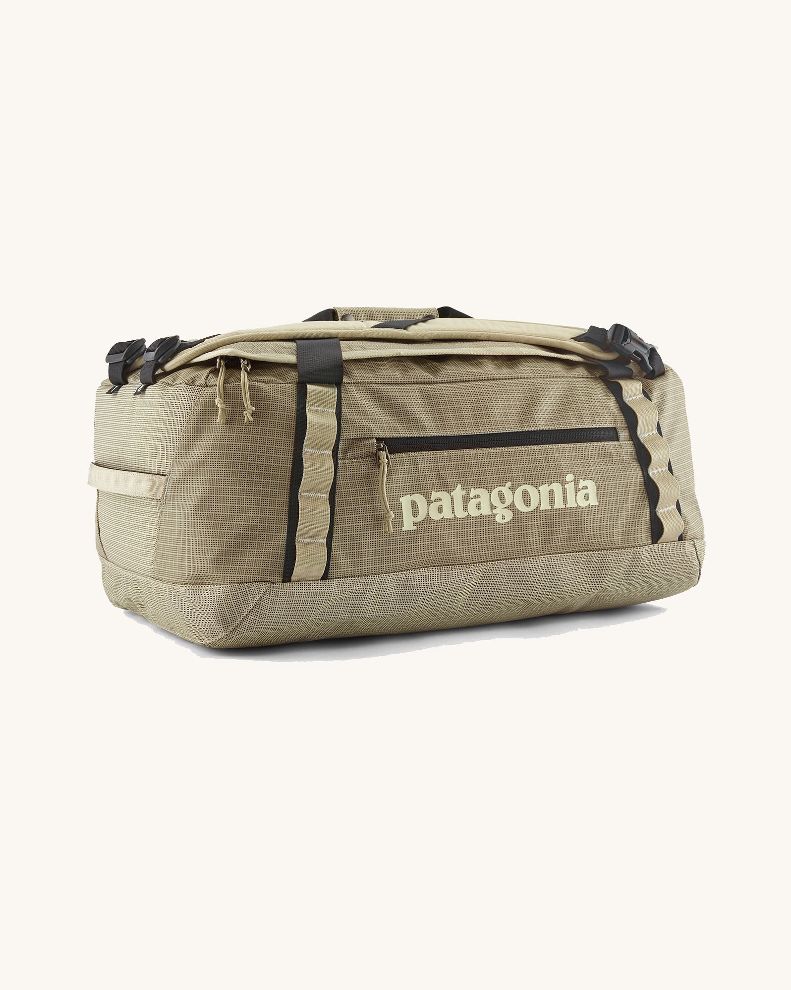 Patagonia black hole 40l duffel bag in light green with black zip details and cream printed logo on front panel