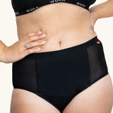 Front of woman wearing the WUKA ultimate high waist period pants 