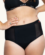 Front of woman wearing the WUKA ultimate high waist period pants 