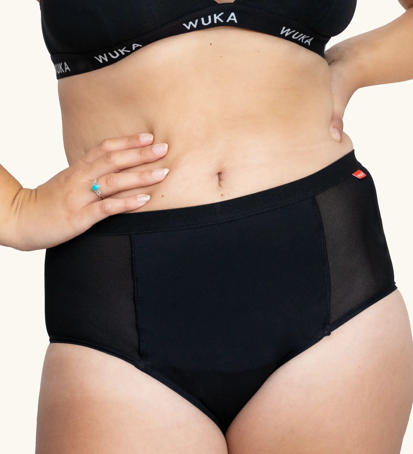 Front of woman wearing the WUKA ultimate high waist period pants 
