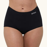 A pair of WUKA adult stretch heavy flow period boxers in black with white branding text on the side
