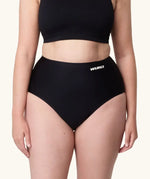 woman wearing the Wuka stretch seamless high waisted period pants 
