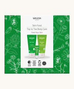 Weleda skin food top to toe gift set. A Weleda gift set presented in a floral outlined decorated box. Weleda have a range of luxurious, natural skin care items available at Babipur. 