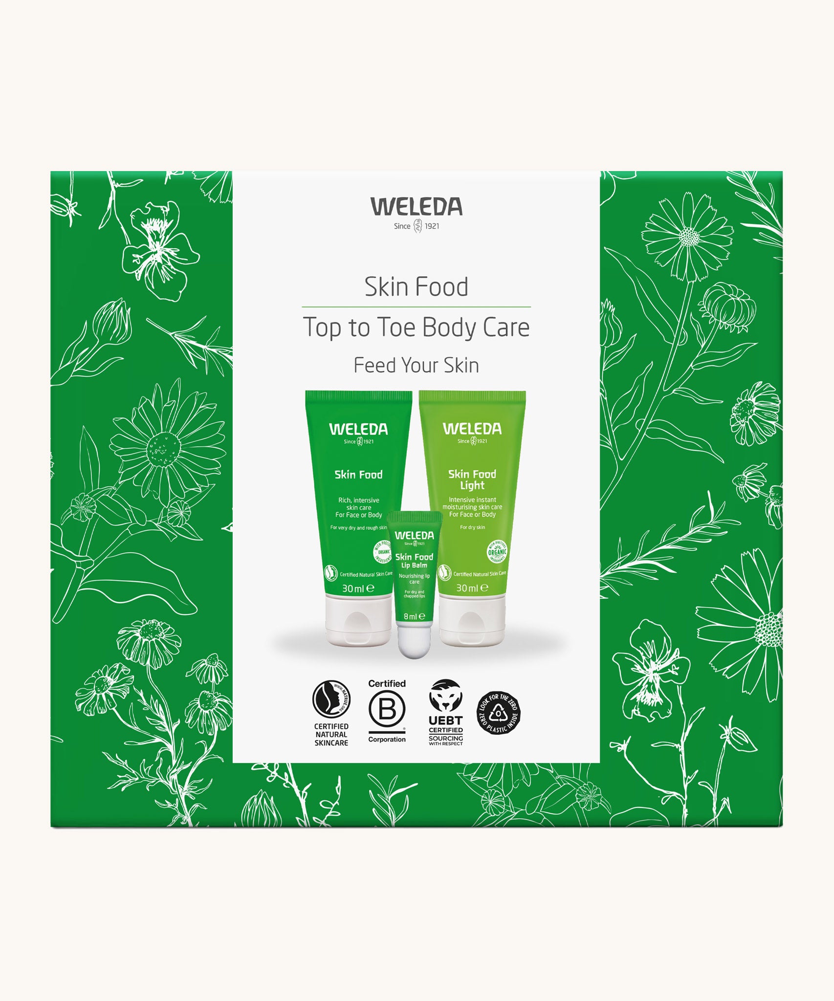 Weleda skin food top to toe gift set. A Weleda gift set presented in a floral outlined decorated box. Weleda have a range of luxurious, natural skin care items available at Babipur. 