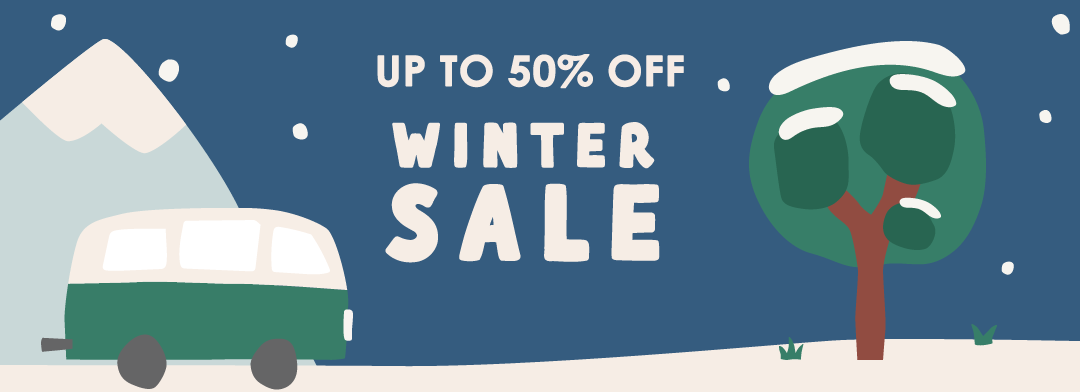 Winter sale banner with a lola the van, tree, and mountain on a blue backgroundin Babipur branding. 