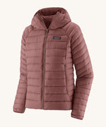 Patagonia Women's Down Sweater Hoody - Dulse Mauve. A light weight  coat in a light pink colour, on a cream background