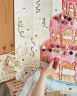Wonderie play cloth everlasting birthdat cake with Grapat wooden decorating pieces.