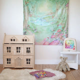 Wonderie forest of wonders play cloth, cotton cloth with fairies, toadstools and woodland creatures, as a wall hanging in the Babipur playroom.