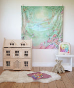 Wonderie forest of wonders play cloth, cotton cloth with fairies, toadstools and woodland creatures, as a wall hanging in the Babipur playroom.
